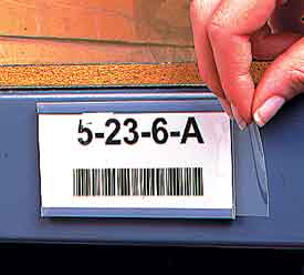 Clear, plastic cover over bar code label in channel